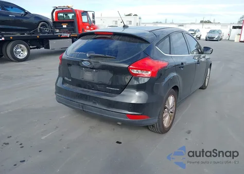 2017 Ford Focus Titanium z USA, uszkodzony, nr VIN 1FADP3N25HL256014